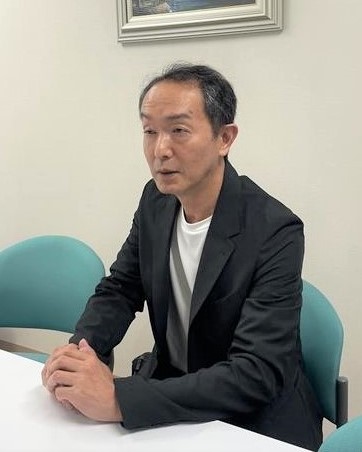 代表取締役社長　酒井健一郎氏